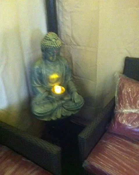 Buddha With Candle